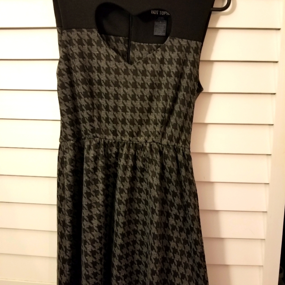 Hot Topic dress with flared skirt and heart shaped cut out chest.
